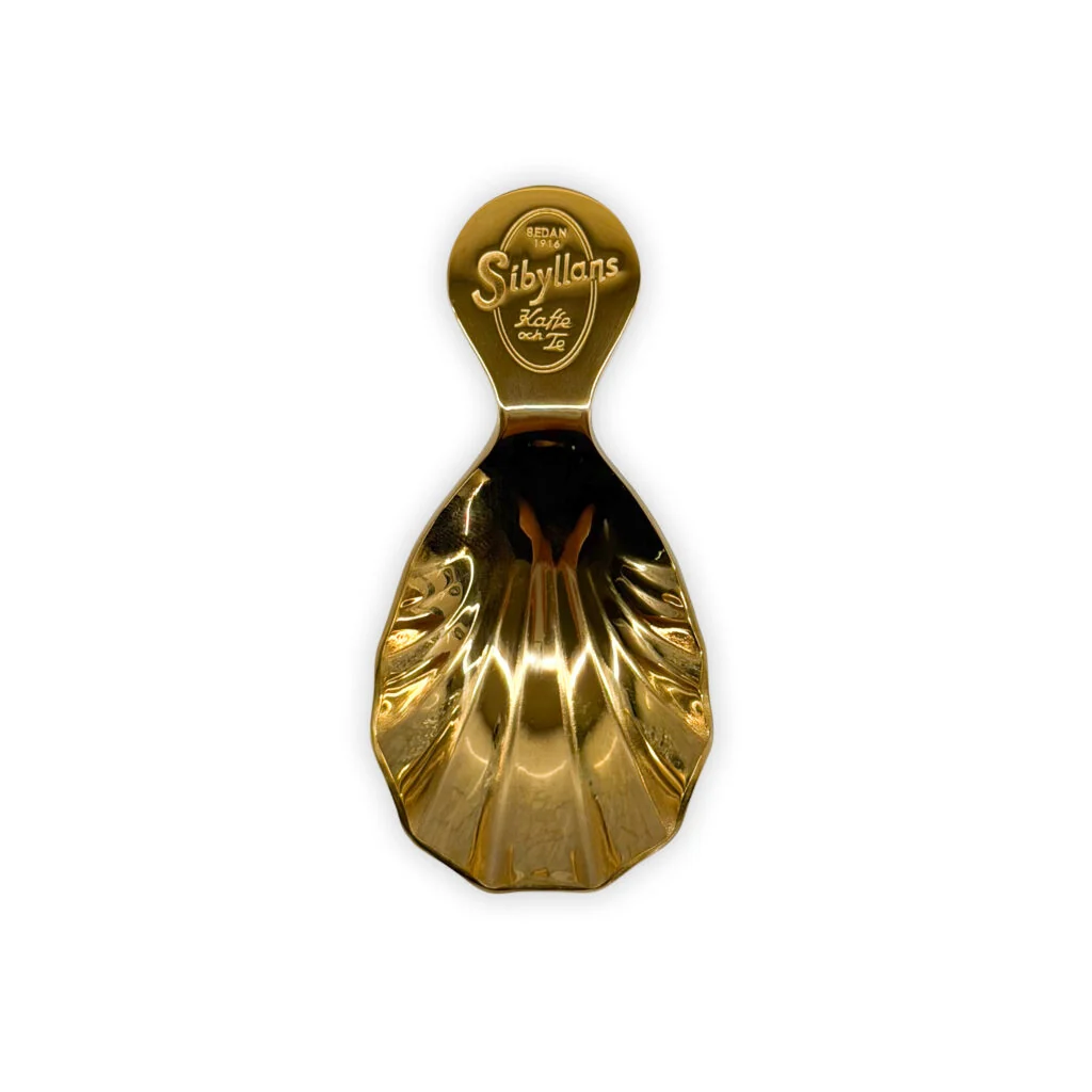 teskopa guld snäckformad